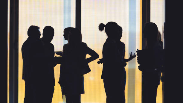 istock Business people silhouettes 941166024
