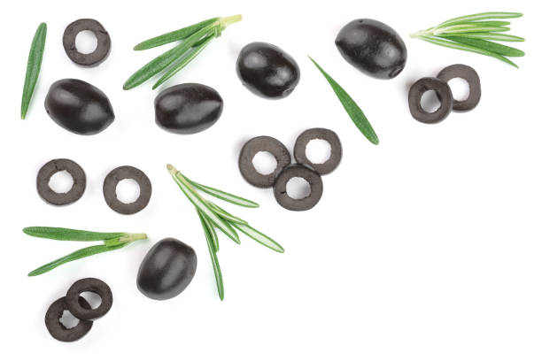istock whole and sliced black olives with rosemary leaves isolated on white background. Top view. Flat lay pattern 941166310