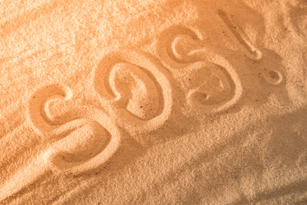 istock Inscription on the sand beach SOS. With space for text 941166434