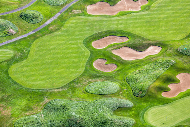istock Aerial view of golf course holes 941166750