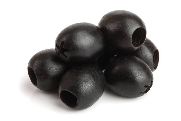 istock whole black olives isolated on white background macro 941167682