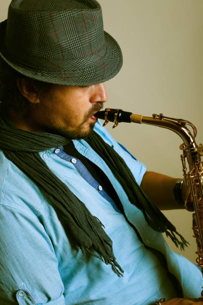 istock Jazz Musician Playing Saxophone 941172264