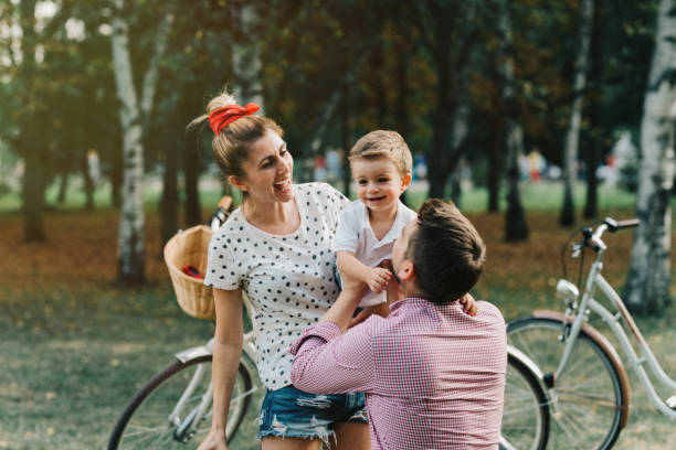 istock Happy family in the park 941172850