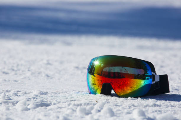 istock Ski and snowboard mask in snow 941180618