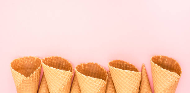istock Ice cream cones on pink background 941184188