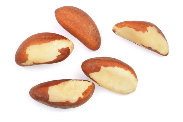 istock Brazil nuts isolated on white background closeup. Top view. Flat lay 941186938