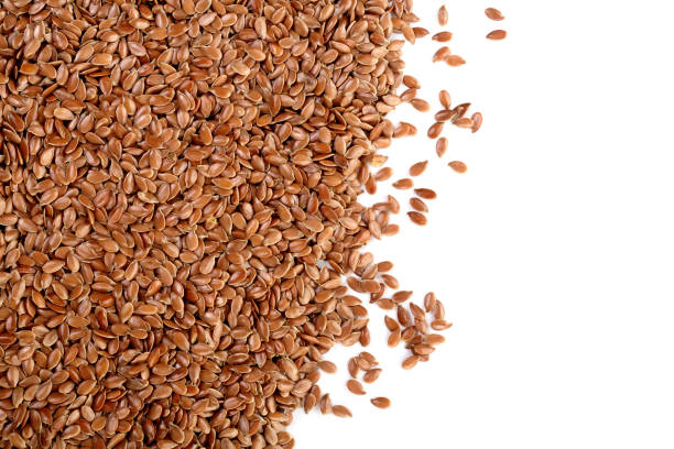 istock flax seeds isolated on white background with copy space for your text. Top view 941190088