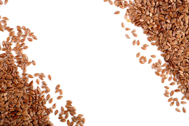 istock flax seeds isolated on white background with copy space for your text. Top view 941190096