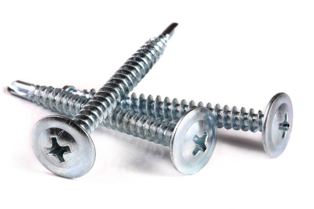 istock three metal screws isolated on white background closeup 941190560