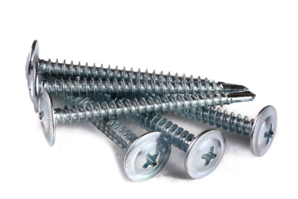 istock metal screws isolated on white background closeup 941190614