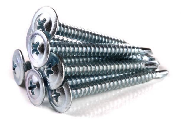 istock metal screws isolated on white background closeup 941190724