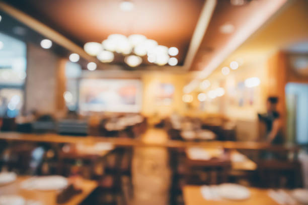 Restaurant cafe or coffee shop interior with people abstract defocused blur background