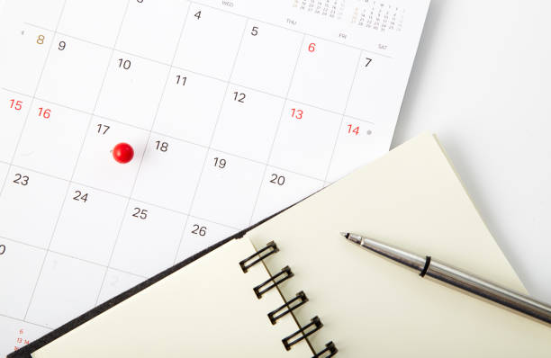 istock Tax day Red push pin on calendar 941213920
