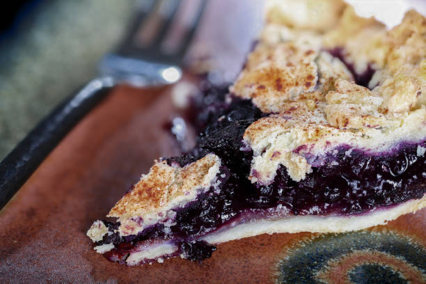 istock Fresh slice of blueberry pie 941216628