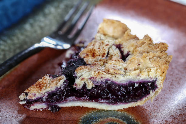 istock Fresh slice of blueberry pie 941216646