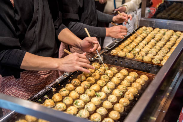 Process to Cooking Takoyaki on hot pan Famous food Osaka Japan street food Process to Cooking Takoyaki on hot pan Famous food Osaka Japan street food takoyaki stock pictures, royalty-free photos & images