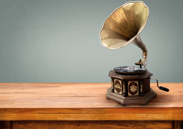 Vintage gramophone Vintage gramophone, retro music player technology. vintage gray background gramophone stock pictures, royalty-free photos & images