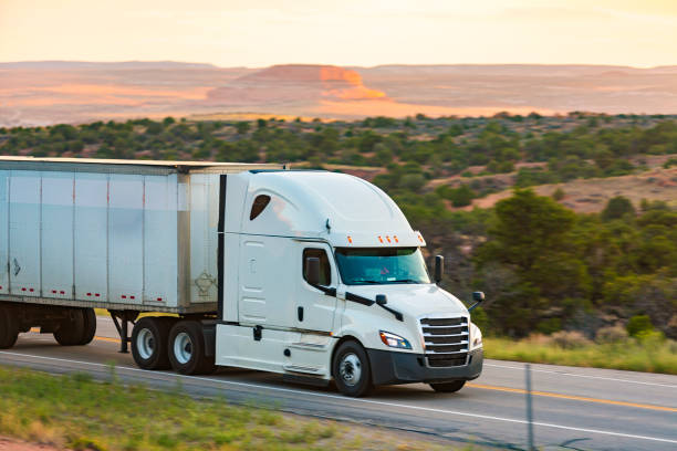 istock Truck at Sunset on the Desert Highway 941233990