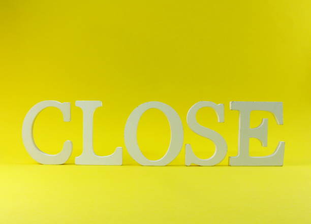 istock close wooden alphabet letter on yellow background 941246484