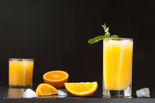 istock Screwdriver cocktail, orange juice with mint and ice. 941249892