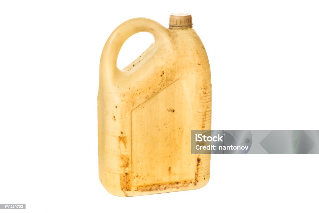 Old plastic jerrycan or gasoline canister fuel can isolated on white background Old plastic jerrycan or gasoline canister fuel can isolated on white background. Canister Stock Photo