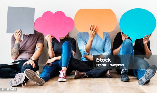 Group Of Diverse People With Speech Bubbles Icons Stock Photo - Download Image Now - Speech Bubble, Advice, People