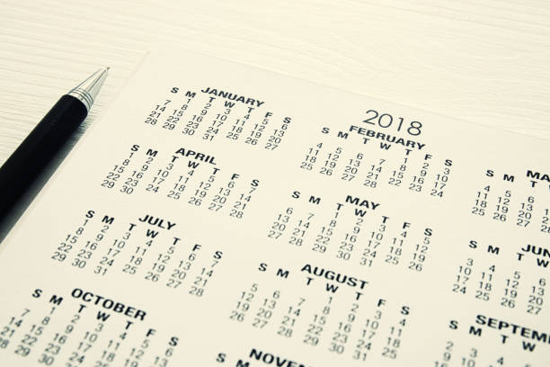 istock image of 2018 calendar background with pen. 941263626