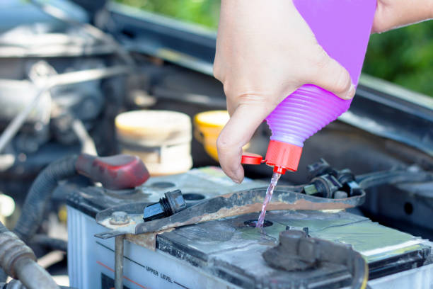 istock Fill distilled water in the battery 941263976