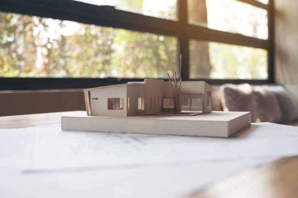istock An architecture model with shop drawing paper 941267734