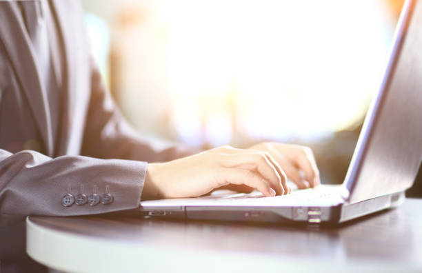 istock close up. businessman typing on laptop keyboard 941267950