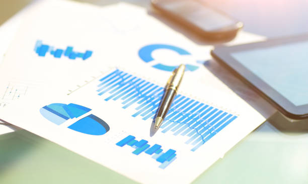 istock financial charts, tablet and pen on the desktop 941268214