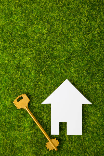 istock Cardboard house and key 941273274
