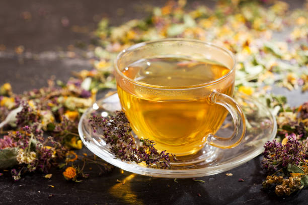 istock Cup of herbal tea with various herbs 941276266