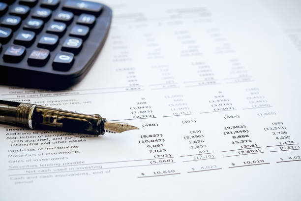 istock Business background, financial data and accounting report concept with pen 941276374