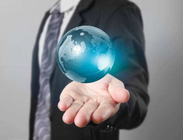 istock lobe ,earth in human hand, Earth image provided by Nasa 941284928