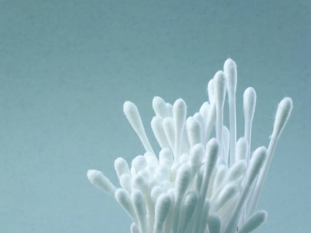 istock whitecotton bud isolated on gray background 941285532