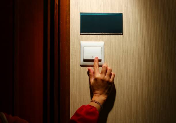 istock women hand pressing door bell 941294460