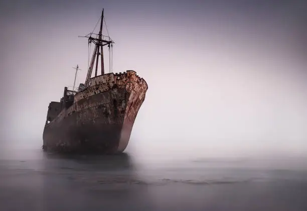 Photo of The famous rusty shipwreck near Gytheio at sunset