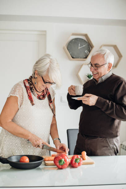 istock Lovely couple in the kitchen 941300046