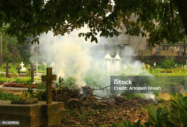 Cremation Scene Smoke In A Graveyard Stock Photo - Download Image Now - Asia, Bagmati Province, Burning