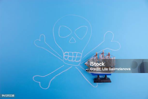 Pirate Ship On Blue Background Stock Photo - Download Image Now - Adventure, Ancient, Blue