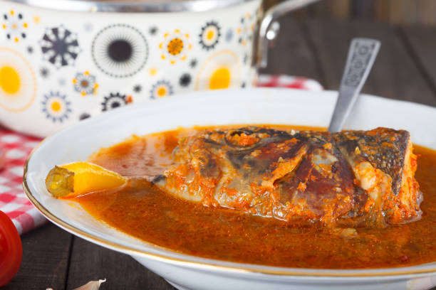 istock Hot and spicy paprika based river fish soup 941313170
