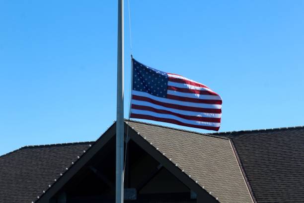 istock American Flag at Half Mast 941313282