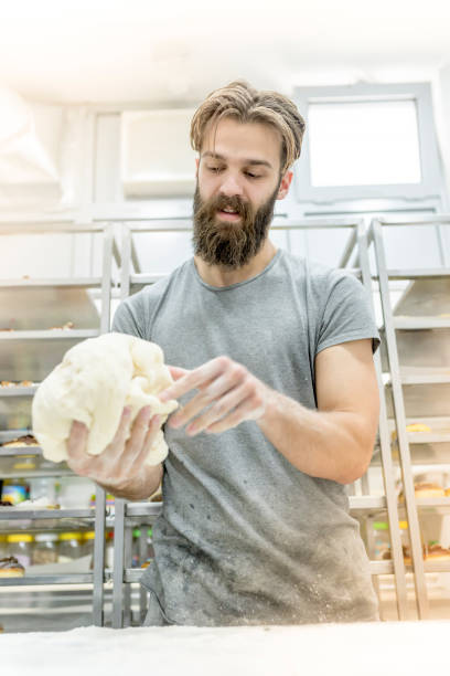 Man playing with flour