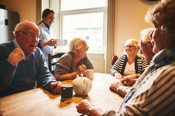 istock Happy senior people having great time at nursing home 941321090