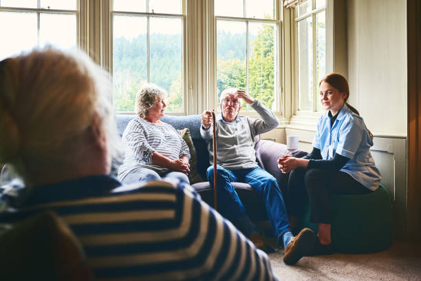 istock Female community nurse visiting senior people 941321386