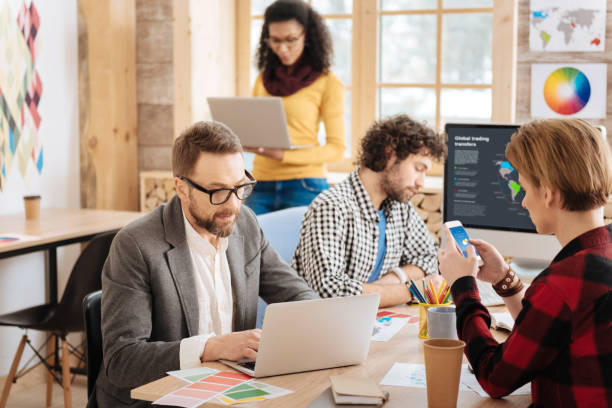 istock Concentrated employees doing their job 941321552