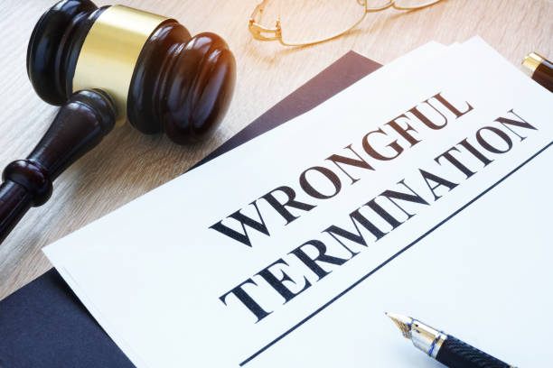 documents about wrongful termination and gavel. - finishing employment issues occupation downsizing imagens e fotografias de stock