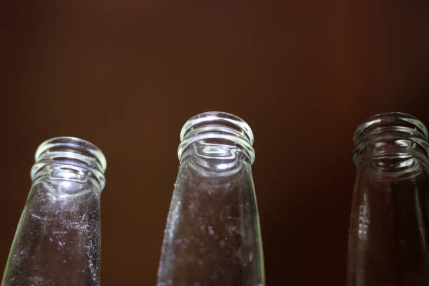 istock Top of glass bottles 941333528