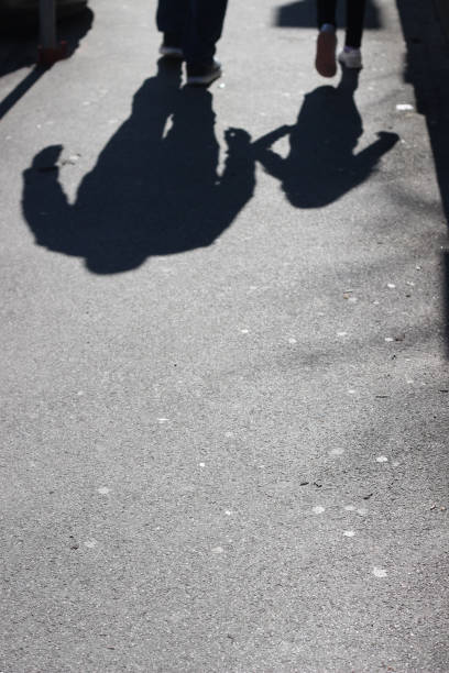 istock Father and daughter silhouettes 941333728